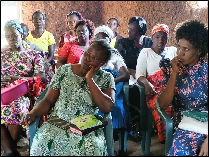 women siting at a Christian meeting in Kenya