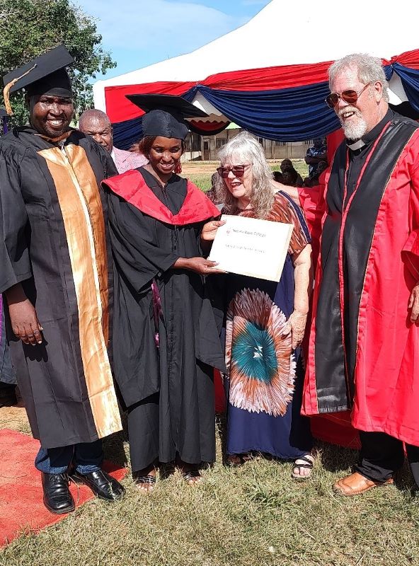 NEEMA Bible College graduation student with Mike and Pat