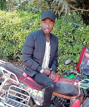 Osa on a bike in Kenya