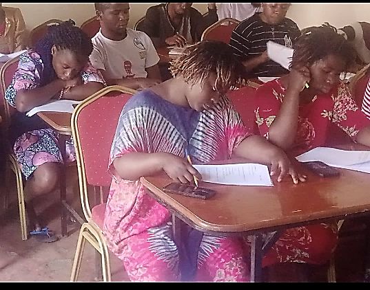 DRC refugees at Neema Bible College class